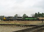 CSX 8676 & HLCX 7181 lead a grain train onto the Wilmington sub